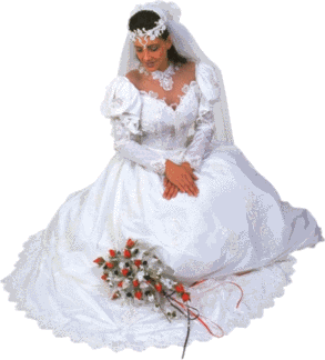 bruid in witte trouwjurk met sluier